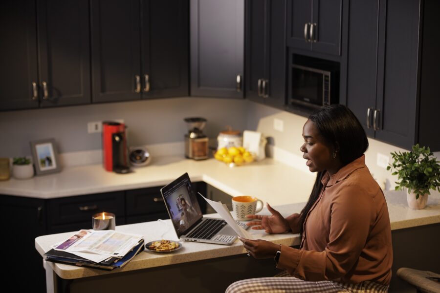 students studying at kitchen counter